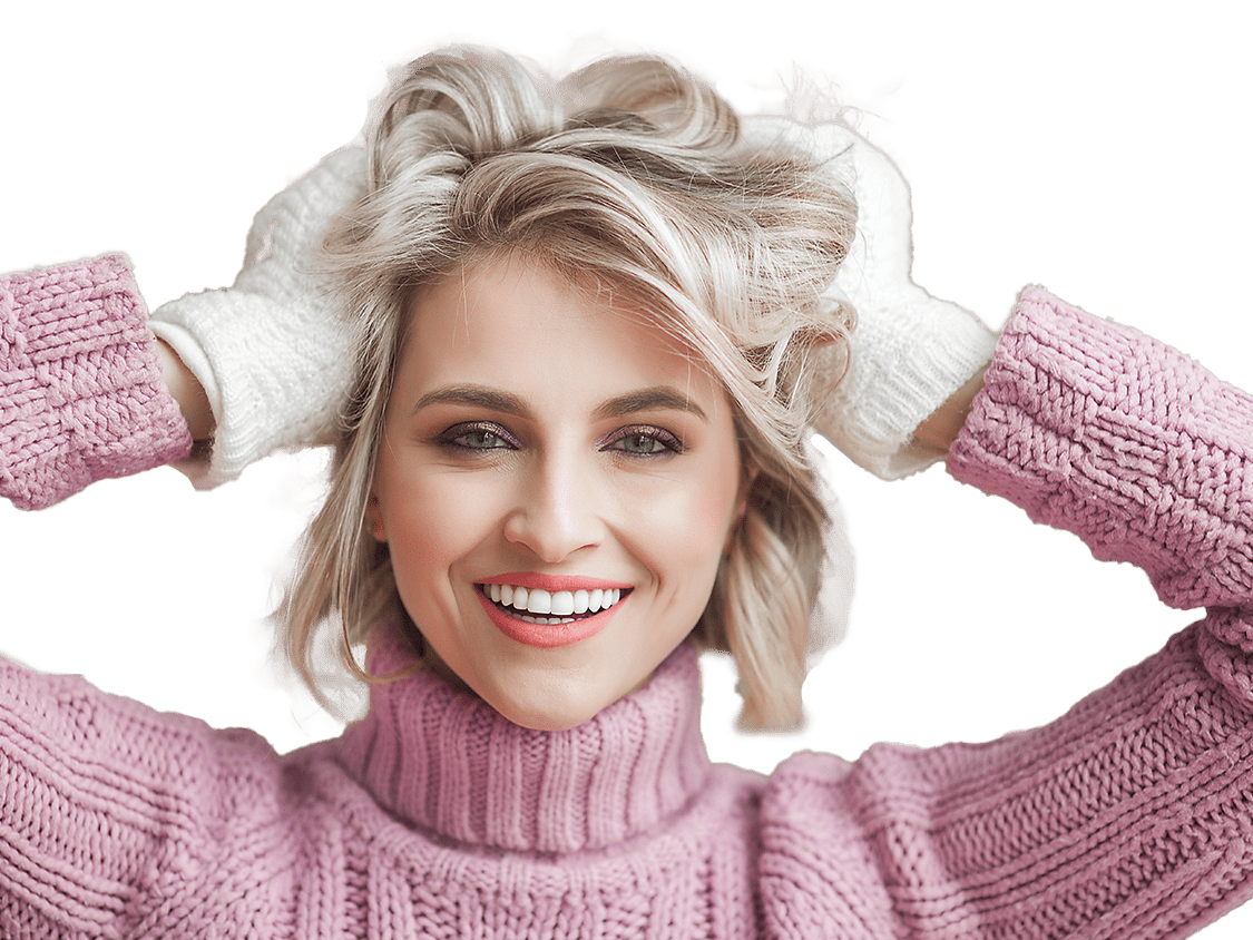 Woman in warm clothes mussing her hair