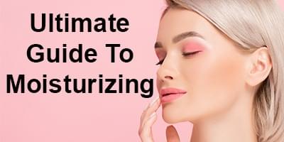 Woman caressing her face with words that read "Ultimate Guide To Moisturizing"