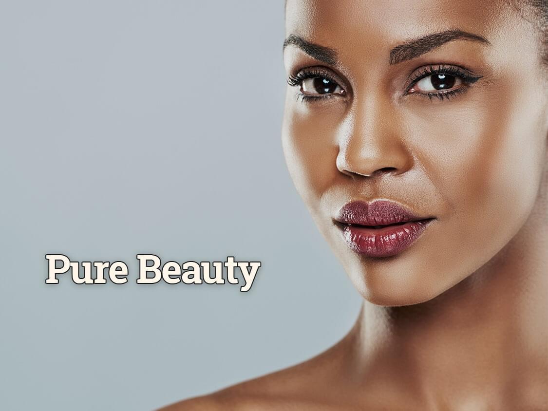 Woman staring seductively at the camera that reads "Pure Beauty"
