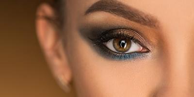 Woman's eye with lots of eye shadow