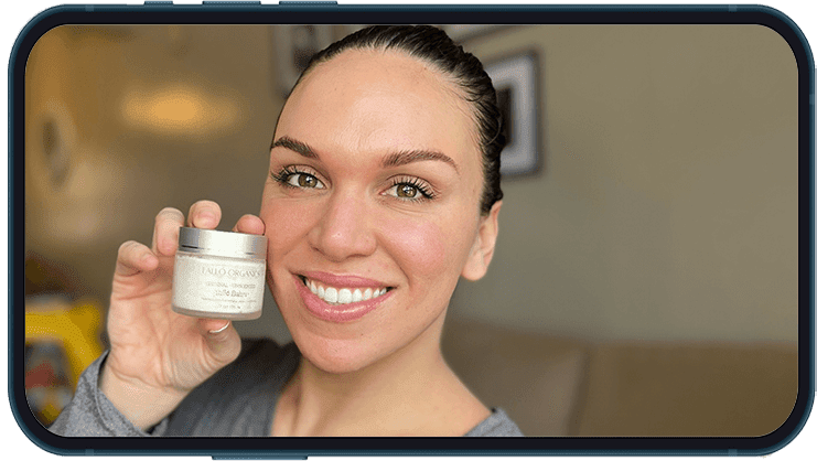 Nichole Rouse holding a jar of Tallo Balm